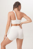 One shoulder asymetric top Como short legging ethically handmade sustainable yoga wear Sunbe Design in white color