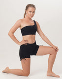 Sunbe Design ethically handmade and sustainable como short legging andOne shoulder asymetric yoga top in color black