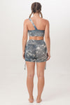 sustainable and ethically handmade one shoulder top and short legging yoga wear Sunbe Design in blue tie-dye